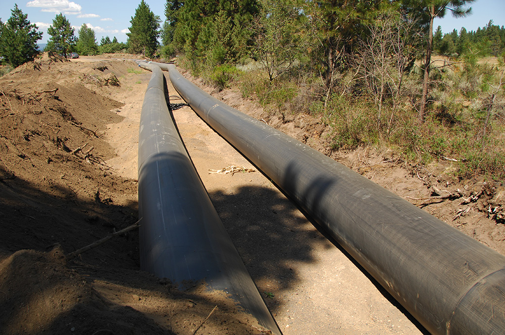 Reclamation improves water management efficiency by converting open canals to piped water networks. Photo by Bureau of Reclamation.