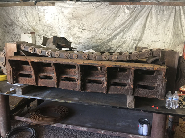 Gate leaf and roller train after removal.