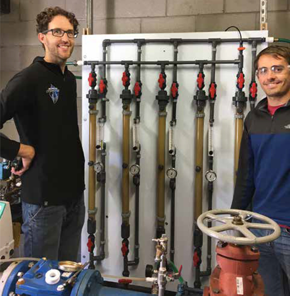 Miguel Arias-Paic (left), and Anthony Kennedy, Reclamation Technical Service Center, commissioning an ion exhchange water treatment pilot unit to remove Chromium-6 from groundwater in Norman, Okla.