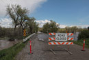 Squaw Creek Road is closed by flooding where it crosses Pryor Creek during the flood of 2011.