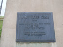 A plaque is located on the outlet works control house at Fort Cobb Dam by Adam Milligan.
