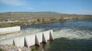 Outflow from Gray Reef Dam, re-regulation of North Platte River/Alcova Powerplant output. Photo by Harold Morrow.