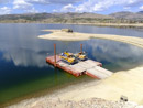 A barge used to haul materials over to Cemetery Island at Canyon Ferry Reservoir for shoreline stabilization. Photo by Taryn Preston.