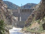 Kortes Dam and Power Plant in Wyoming during a June spill with the spillway in use. Photo by Laurie Schwieger.