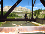 Nick Clough, Civil Engineer from Reclamation's Technical Service Center in Denver, inspecting the Sun River Bridge (Montana). Photo by Jeff Ticknor.