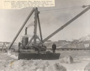 A floating derrick constructing the diversion dam for The Lower Yellowstone Project in 1912.