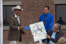 Mr. Tommy Christian, Ft. Peck Tribal Councilman (left), Floyd G. Azure, Tribal Chairman Fort Peck Assiniboine & Sioux Tribes (center right) and Dr. Caleb Shields, former Tribal Chairman (seated at right) during the naming ceremony for the treatment plant.