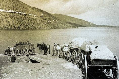 Freight wagons boarding Reclamation Service ferry at Roosevelt, 1910. (Reclamation photograph)