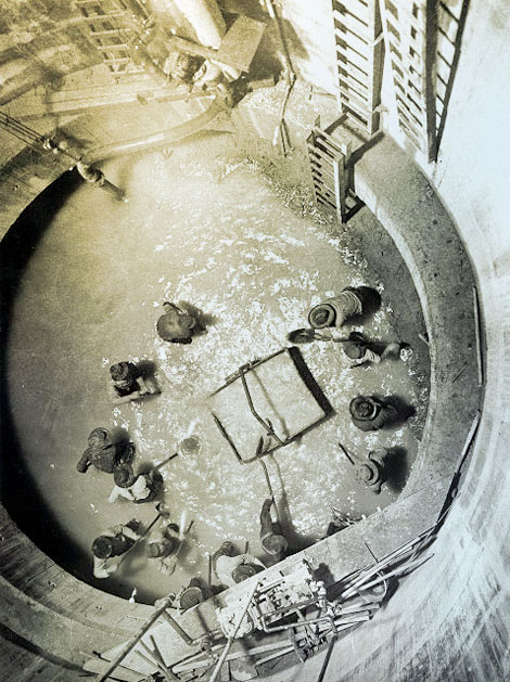 Colorado River Siphon. Looking down 55 feet into the Arizona shaft during the night shift, 1910. (National Archives, Yuma Projects Office)