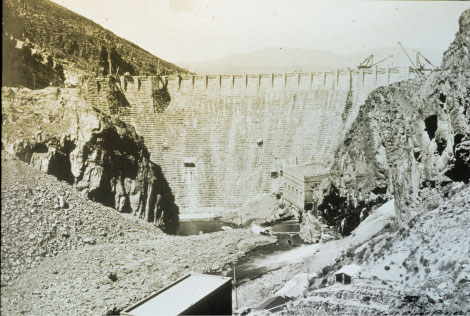 View of the dam nearing completion. Photograph taken June 1910 probably by Walter J. Lubkin, U.S. Reclamation Service photographer.