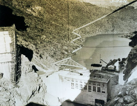 As the second dam constructed from 1924 to 1927 by the Salt River Valley Water Users Association, Horse Mesa Dam was to provide inexpensive power to the copper mines of Globe and Miami. Financing from Inspiration Consolidated Copper Company allowed for construction, and the Company agreed to purchase all the Horse Mesa's power.  The dam was designed by C. C. Cragin and Bureau of Reclamation engineers. The result was a concrete thin-arch dam standing 305 feet high from bedrock to the top of the coping and a crest length of 660 feet.  Thickness at the base varies from 43 to 57 feet, with the dam being 8 feet thick at the top.  The arch's maximum span is 450 feet. (SRP photograph)