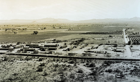 A view of the Bureau of Reclamation CCC Camp BR-19 in Tempe. The canal in the foreground is the Cross Cut Canal that links the Arizona Canal and Grand Canal. (Reclamation photograph)