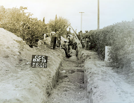 Another open lateral is being piped by a CCC work crew in this 1937 photograph.  A large part of the SRP infrastructure was upgraded by CC crews. (Reclamation photograph)