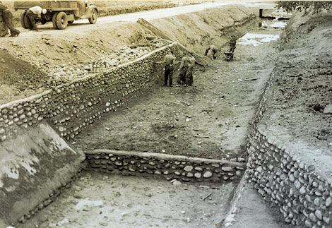 Some canal walls were stabilized with cobbles set in concrete to reduce erosion. (Reclamation photograph)