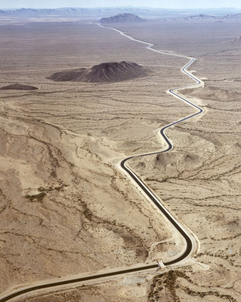 Iconic image of the Central Arizona Project canal, reaching 336 miles from the Colorado River to the Tohono O'odham nation south of Tucson, Arizona.