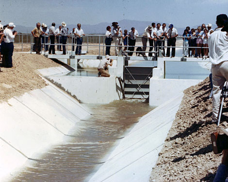 Celebrating the turn-out of water from the Central Arizona Project aqueduct into Harquahala Valley Irrigation District's canal system – first delivery via the CAP for beneficial use in an irrigation system, May 22, 1985. Photo courtesy of HVID.