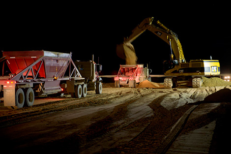 Construction Activities - February 2009 - Skilled crews from the Ames-Coffman Joint Venture and Bureau of Reclamation engineers and inspectors are working in concert day and night through two 10-hour shifts to meet the ambitious 2010 deadline for project completion.
