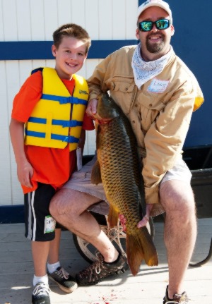 Boy with large fish