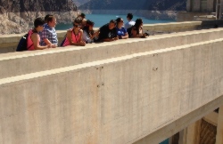 Explains to the students how water from the Lake Mead enters the intake towers.