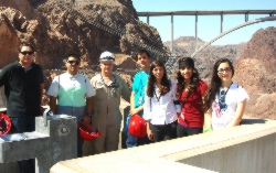 This group of students posed with their escorts Jed Blake, left, and Steve Redmond, third from left.