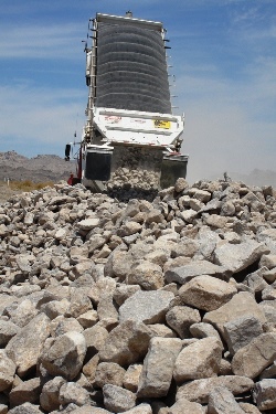 Delivering 880 tons of rock for use as riprap to reduce the effects of erosion on the very sandy soil