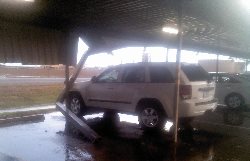 Photo one of the storm damage, the Yuma Area Office sustained to its parking structure.