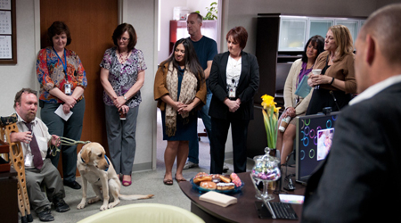 John Tarabilda, seated with Oro at his side, talking to employees during a meeting in the Lower Colorado Regional Director's office. John Tarabilda, seated with Oro at his side, talking to employees during a meeting in the Lower Colorado Regional Director's office.