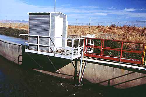 photograph: Looking north at the maintenance and calibration shed for the water quality multiprobe installed behind the trash rack at the Tracy Fish Collection Facility, Tracy, California
