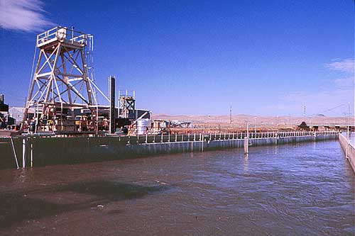 photograph: Looking southwest at the primary louvers and the cleaning tower at the TFCF