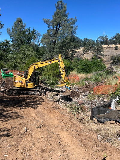 An excavator working at the Lower Ripley Creek site