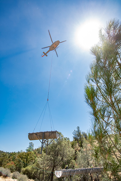 Section of Flume #9 airlifted with helicopter