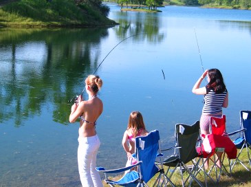 photograph of girls fishing in Oak Shores; click for larger photo