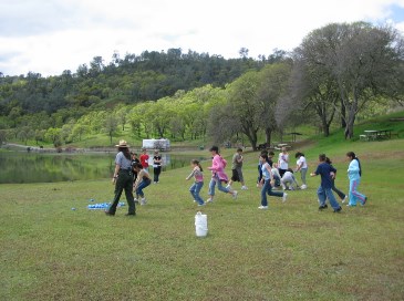 photograph of Ranger with Kids; click for larger photo