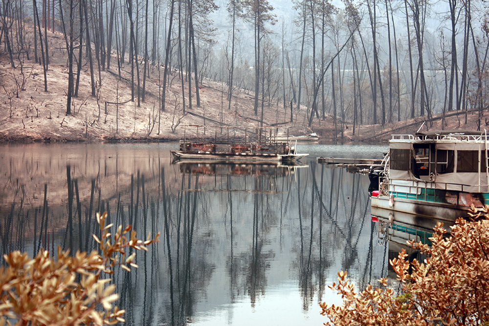 A few of an estimated 20 boats burned by the Carr Fire shown here at Whiskeytown Reservoir in Northern California's Shasta County on July 28, 2018. (Reclamation photo by Laura Williams / Released)