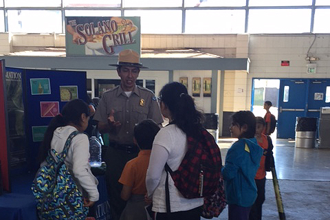 Park Ranger Hugo Martinez teaches children about Lake Berryessa at Solano County Fair Association’s 15th annual Youth Ag Day.