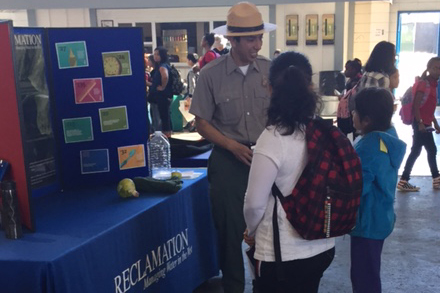 Park Ranger Hugo Martinez teaches children about Lake Berryessa at the Youth Ag Day hosted by the Solano County Fair Association.
