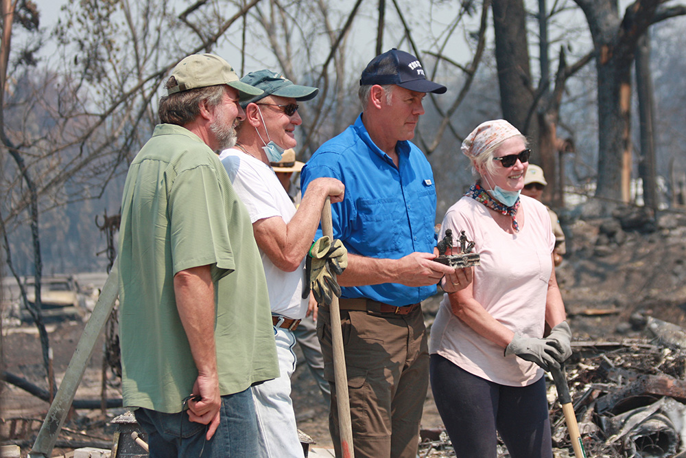 Interior Secretary Ryan Zinke (in blue) with Carr Fire affected residents near Redding, California.