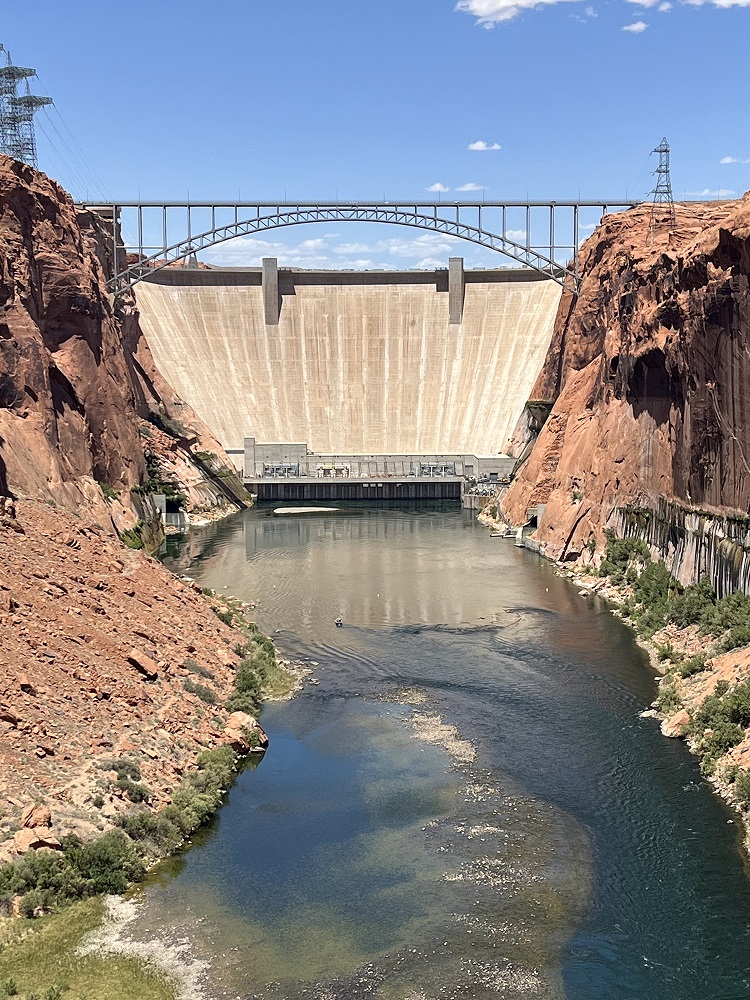 Glen Canyon Dam with the Colorado River below it.