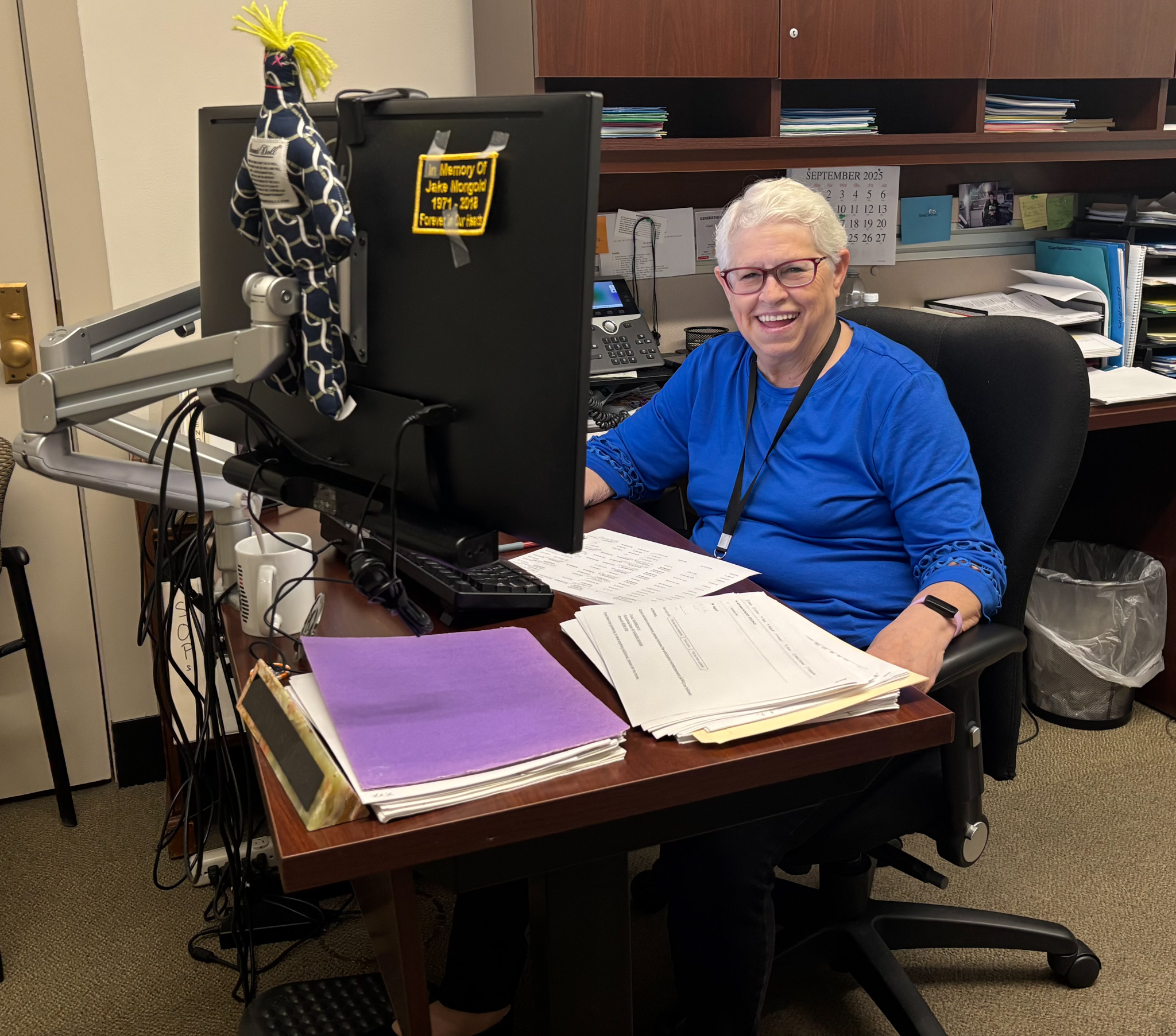 Glenna Sawyers, Bureau of Reclamation program analyst, works at her desk in Washington, D.C., on Sept. 23, 2025.
