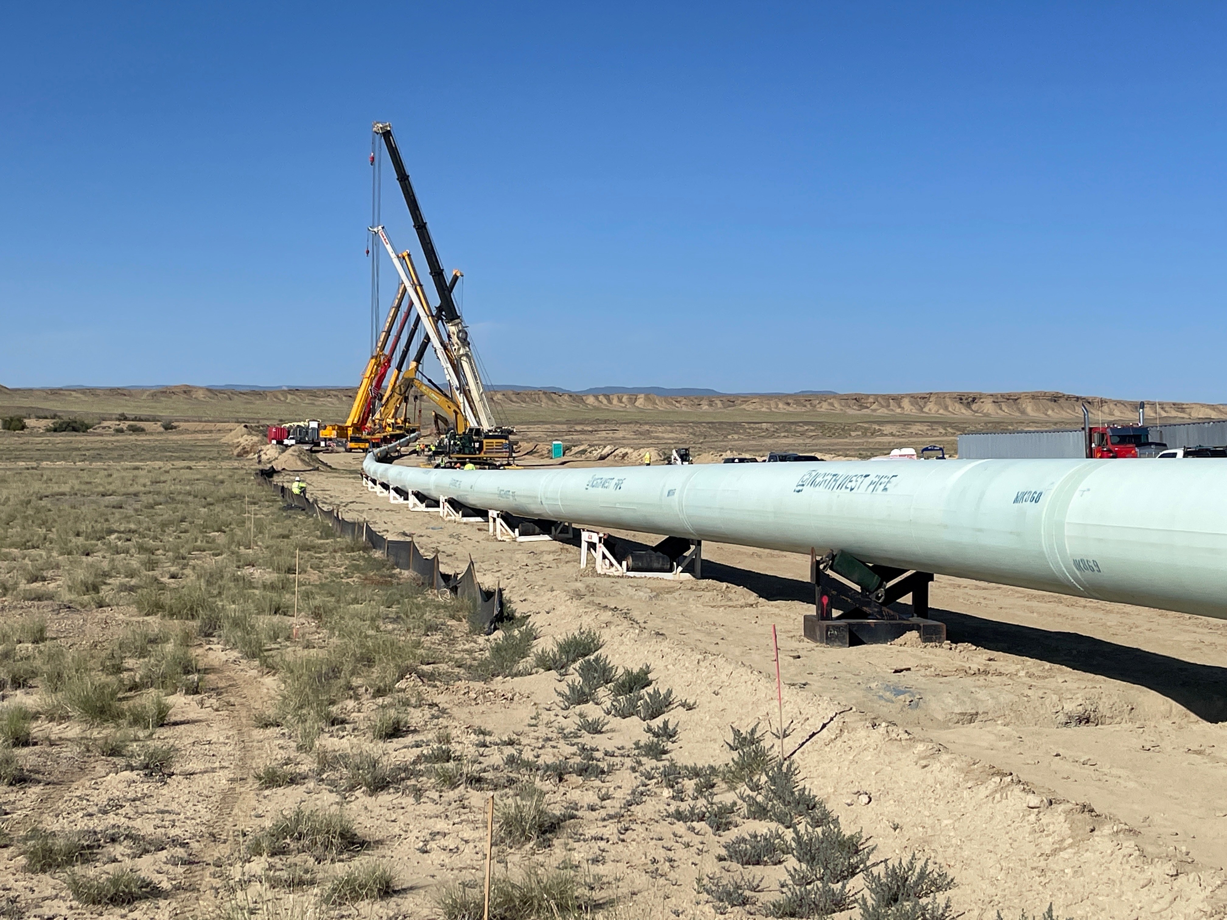 Horizontal Directional Drill pullback method being utilized on Reach 4B near Shiprock, New Mexico on the Navajo Gallup Water Supply Project in June 2025. This type of pullback will be used for construction of the Block 2-3 Pipeline which begins at the Frank Chee Willetto Reservoir approximately 17 miles east of Shiprock, New Mexico, and ends at the San Juan Lateral Water Treatment Plant.