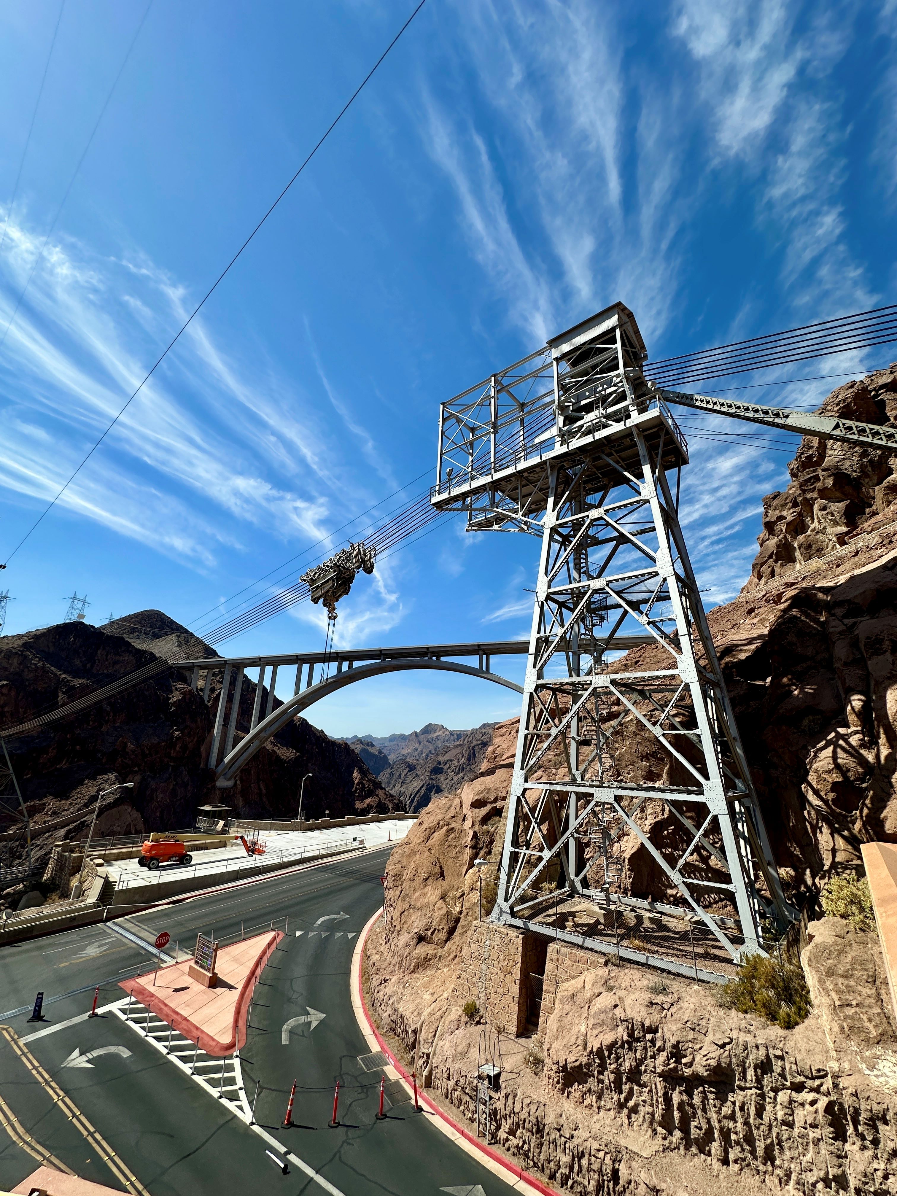 The cableway system at Hoover Dam, with the cableway carriage positioned above the main access road, requires further assessment before visitor access can safely resume. USBR