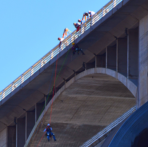 Jenna and fellow inspector lowering down for the inspection of the drumgate.