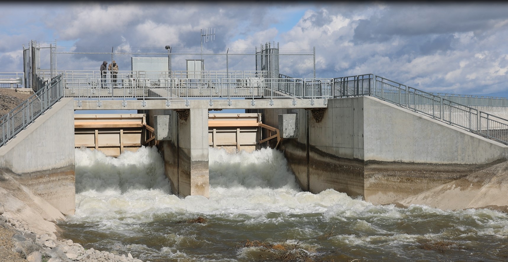 The first release of water at Minidoka Dam for the 2026 season in southern Idaho, April 2, 2026. Burley Irrigation District employees opened the headgates at Minidoka Dam, beginning the annual “water up” process that primes the region’s extensive canal network for spring and summer deliveries. (Bureau of Reclamation photo by Marc Ayalin)