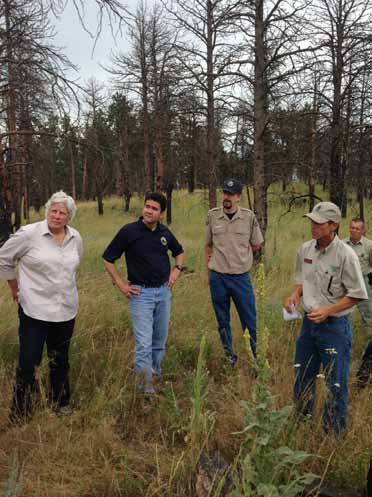 In July 2014, a year after the WWEP signing, ECAO Area Manager Jaci Gould and then-Commissioner Mike Connor join the Colorado State Forest Service and U.S.D.A. Forest Service on a tour of the fire treatment area around Horsetooth Reservoir.