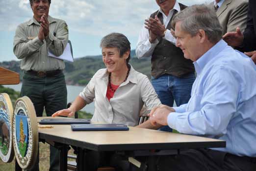 July 2013: DOI Secretary Sally Jewell and USDA Secretary Tom Vilsack sign the Western Watershed Enhancement Partnership at Horsetooth Reservoir.