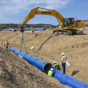 Pipe being installed on the Navajo Gallup project.