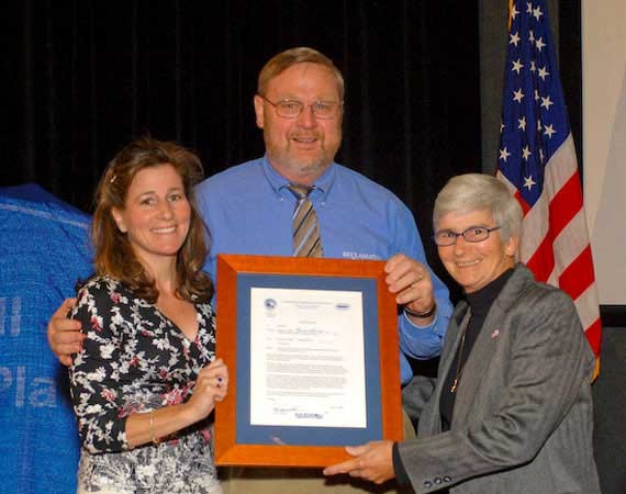 Photo taken May 12, 2009. Bill McDonal presents framed letter to Dell Keys and her daugher, Robin Fisher.