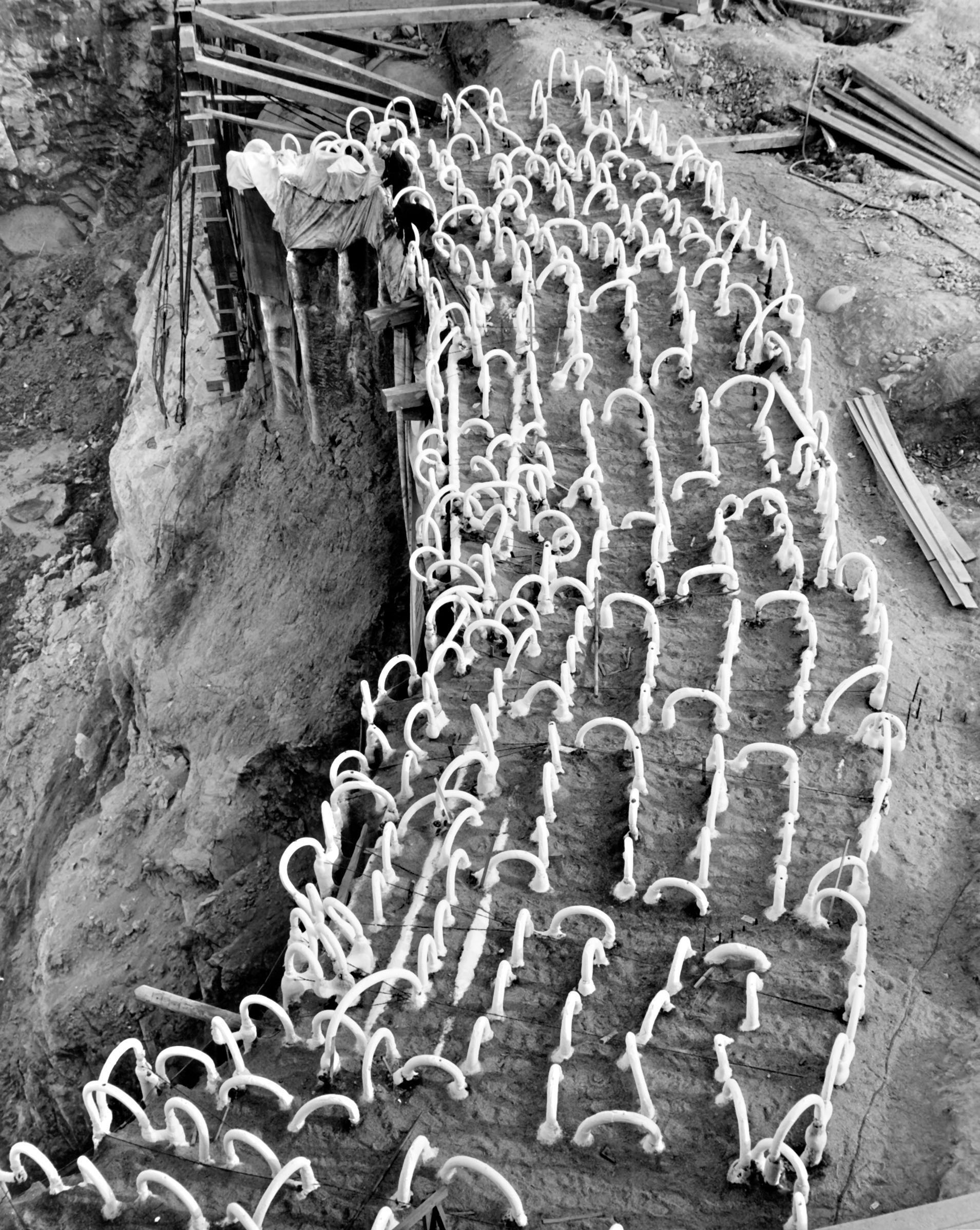 Photo taken November 11, 1936. The completed frozen arch at Grand Coulee Dam.