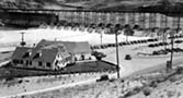 The Green Hut restaurant in the foreground was built by C.D. Newland on leased land here at Grand Coulee Dam.