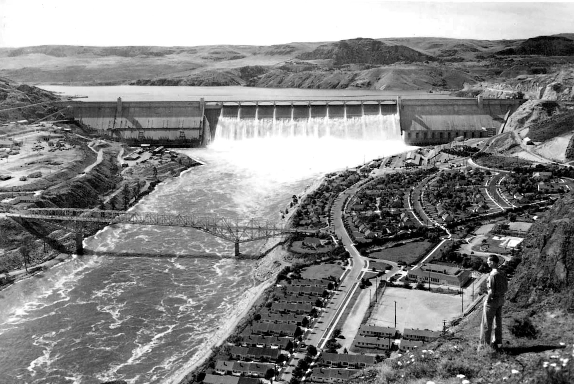 Photo taken June 22, 1942. View of the Grand Coulee Dam taken from the north cliffs below the dam.